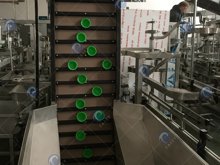 elevator cap sorter of water bottle filling production line