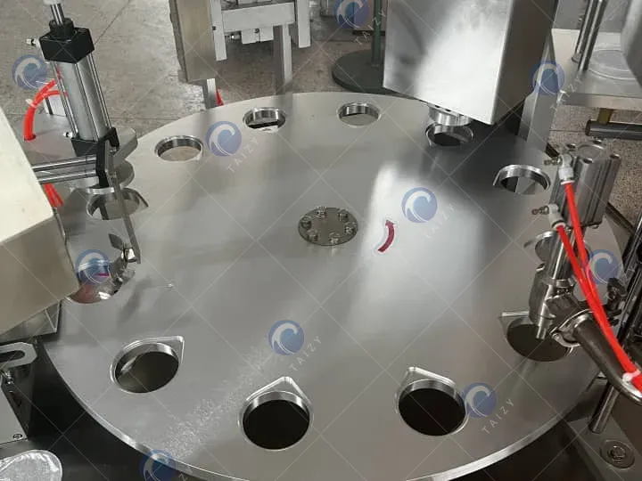 Supplying A Rotary Cup Filling Machine To An Australian Cheese Factory 2 Turntable of cup and cone filling machine