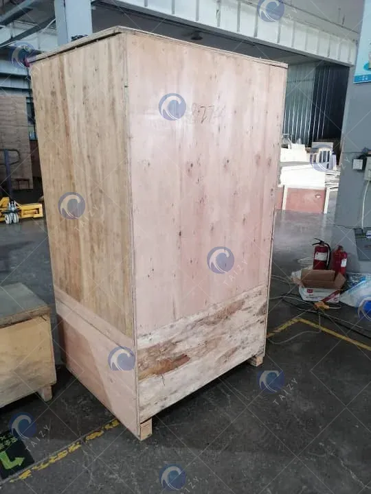 Tea bag packing machine packaged in a wooden crate